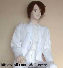 Doll in white suit